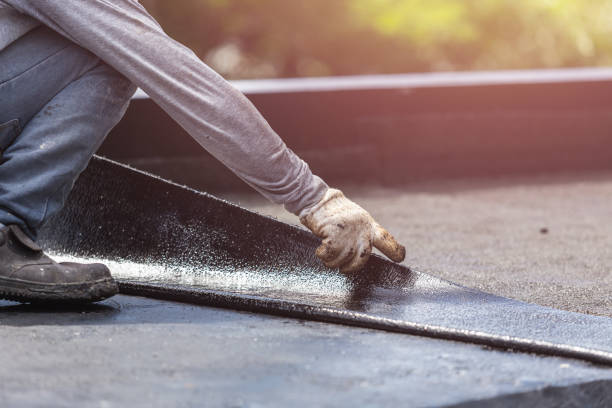 Professional Waterproofing technician working in Athens, MI